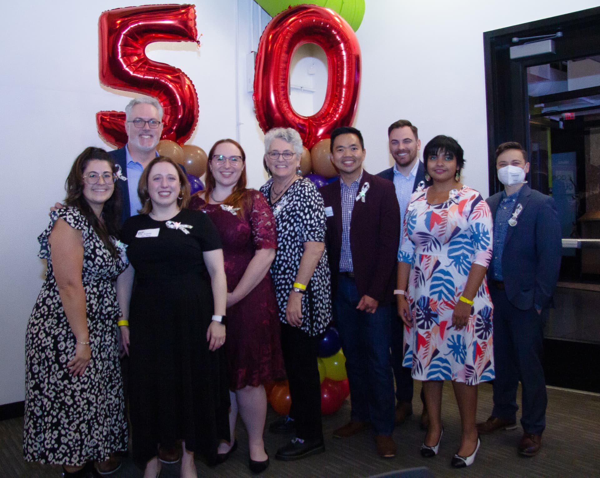 Joseph Alcantara celebrating with the SpeakOUT Boston team