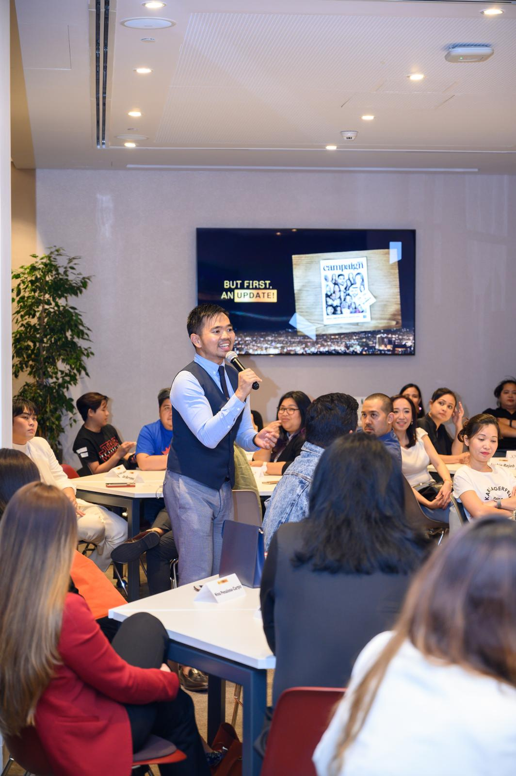 Joseph Alcantara facilitating a workshop with a room of participants